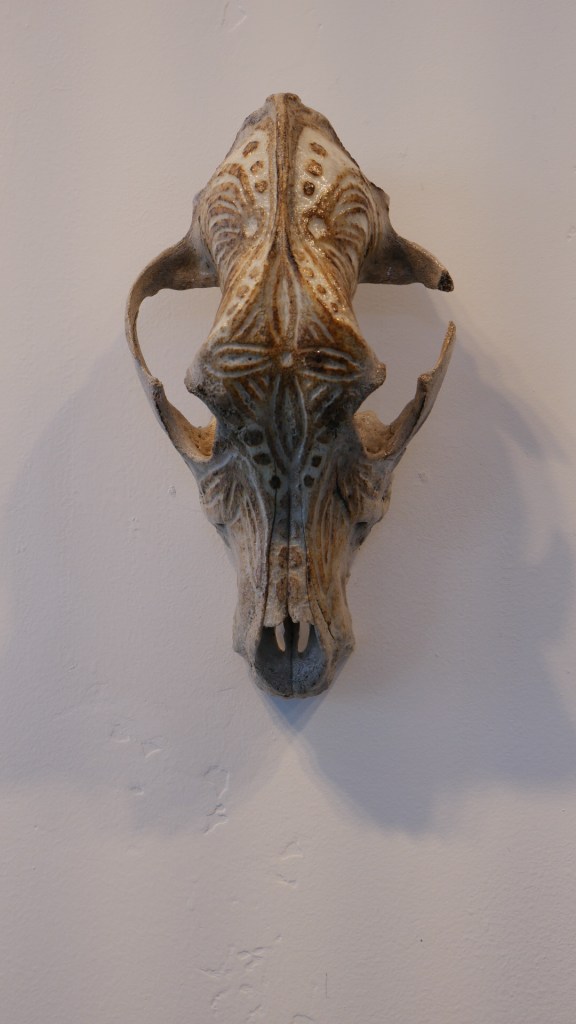 Scrimshaw skull with pattern by artist Adri De La Cruz